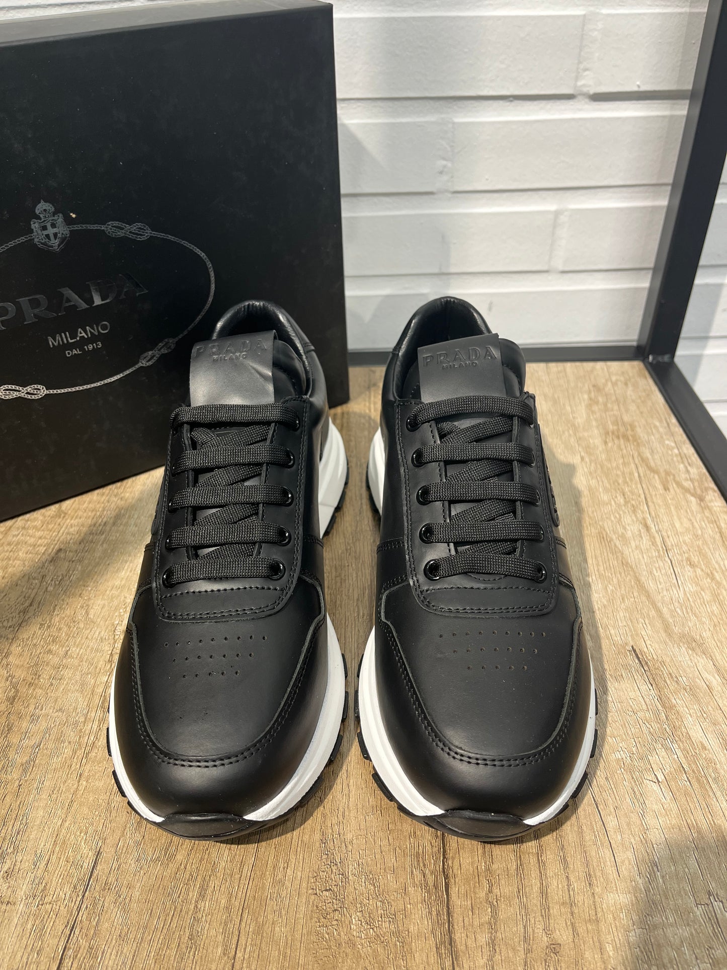 Prada Prax Black/White Leather Sneakers