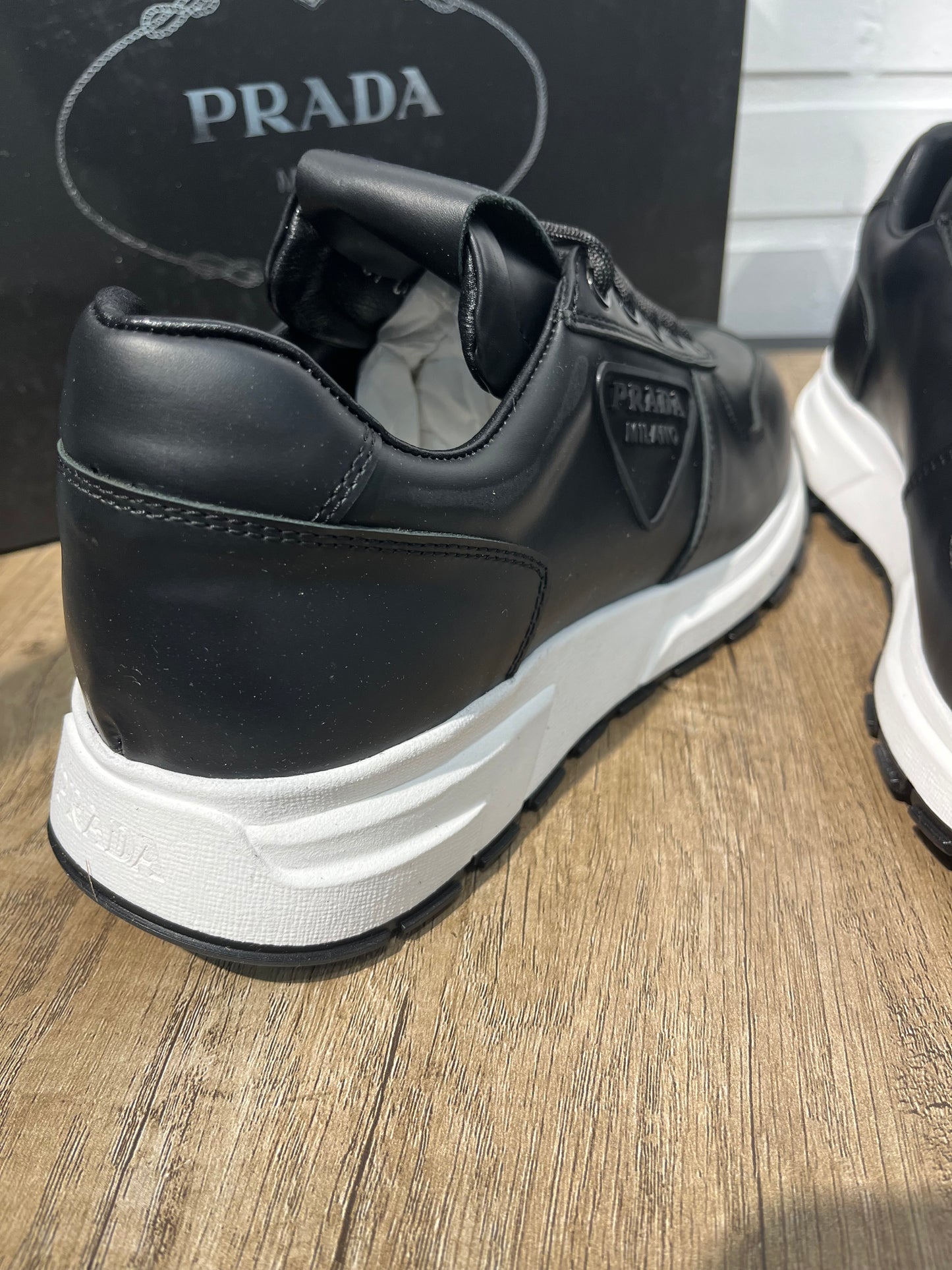 Prada Prax Black/White Leather Sneakers